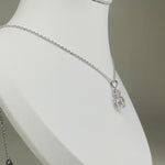 Load and play video in Gallery viewer, • 1ct Solitaire Moissanite Diamond Pendant Necklace •
